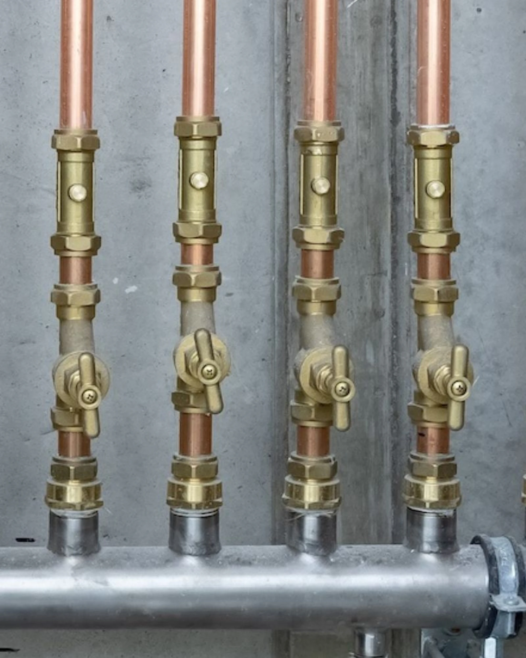 brymec brass compression fittings installed with copper pipe